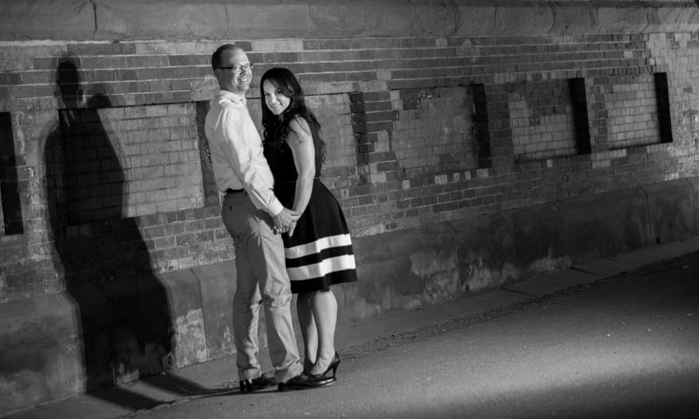 photo of Samara & David under a bridge in Central Park
